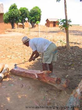 chopping firewood in Fiadanana