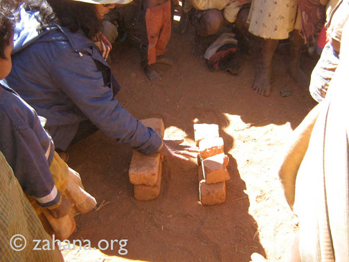 Teaching how to build and impoved cookstove in Madagascar