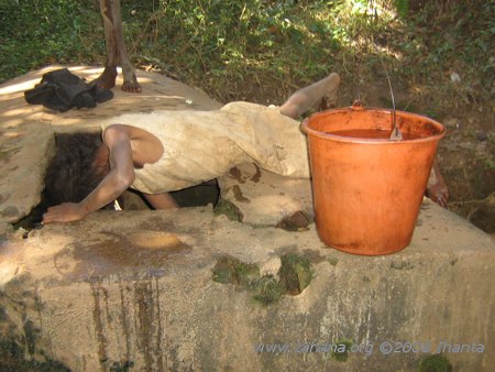 Getting water from a well in Fiarenena Madagascar